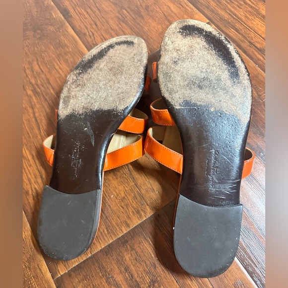 Salvatore Ferragamo tangerine, patent leather slide in sandals w/leather sole.